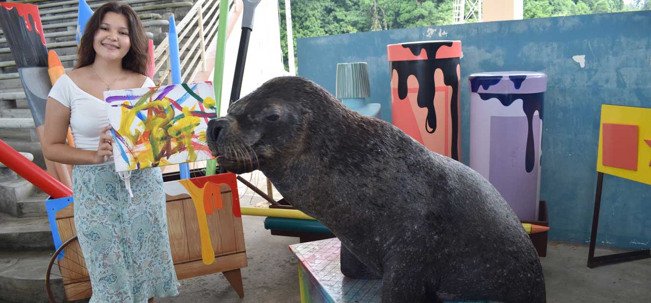 girl paint with sea lion